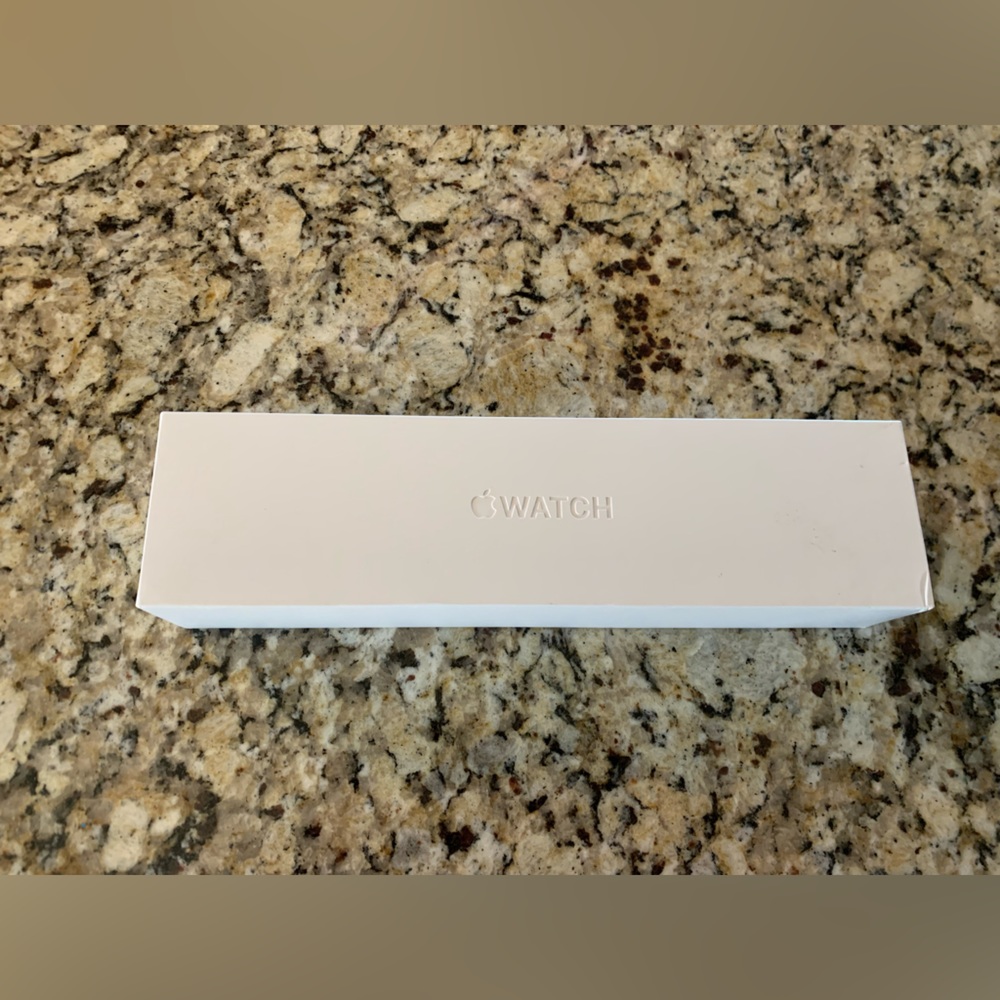 Apple Watch Series 5 40mm Gold with pink band.